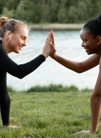 Two women engaged in sports